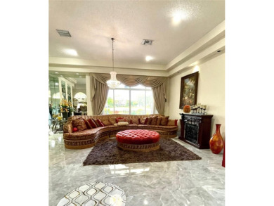 Located behind the prestigious guard-gated entrances of Eagle on TPC Eagle Trace in Florida - for sale on GolfHomes.com, golf home, golf lot