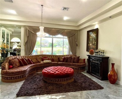 Located behind the prestigious guard-gated entrances of Eagle on TPC Eagle Trace in Florida - for sale on GolfHomes.com, golf home, golf lot
