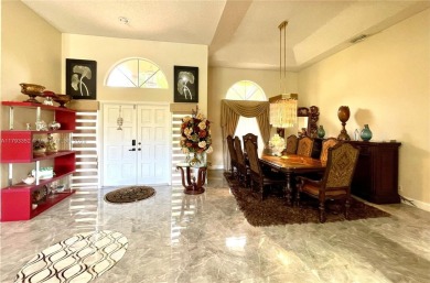 Located behind the prestigious guard-gated entrances of Eagle on TPC Eagle Trace in Florida - for sale on GolfHomes.com, golf home, golf lot