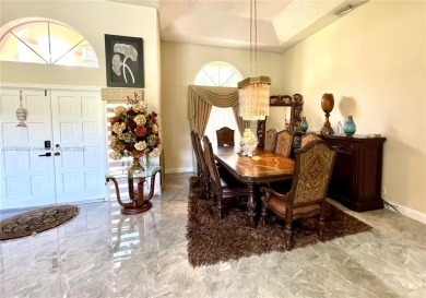 Located behind the prestigious guard-gated entrances of Eagle on TPC Eagle Trace in Florida - for sale on GolfHomes.com, golf home, golf lot