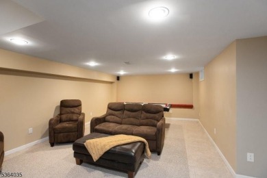 Welcome to this serene and lush property set on nearly an acre on Warrenbrook Golf Course in New Jersey - for sale on GolfHomes.com, golf home, golf lot