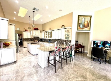 Located behind the prestigious guard-gated entrances of Eagle on TPC Eagle Trace in Florida - for sale on GolfHomes.com, golf home, golf lot