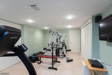 Welcome to this serene and lush property set on nearly an acre on Warrenbrook Golf Course in New Jersey - for sale on GolfHomes.com, golf home, golf lot