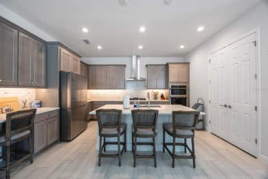 Discover refined, coastal, luxury living in this immaculate on IMG Academies Golf and Country Club in Florida - for sale on GolfHomes.com, golf home, golf lot