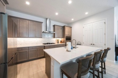 Discover refined, coastal, luxury living in this immaculate on IMG Academies Golf and Country Club in Florida - for sale on GolfHomes.com, golf home, golf lot