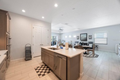 Discover refined, coastal, luxury living in this immaculate on IMG Academies Golf and Country Club in Florida - for sale on GolfHomes.com, golf home, golf lot
