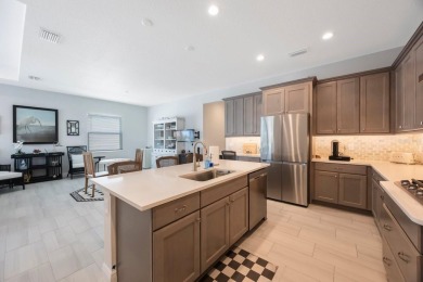 Discover refined, coastal, luxury living in this immaculate on IMG Academies Golf and Country Club in Florida - for sale on GolfHomes.com, golf home, golf lot