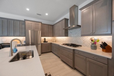 Discover refined, coastal, luxury living in this immaculate on IMG Academies Golf and Country Club in Florida - for sale on GolfHomes.com, golf home, golf lot