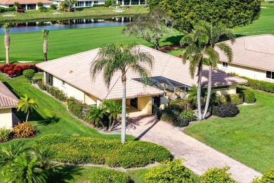 Welcome to your dream home in a fabulous country club setting! on Quail Ridge Golf Course and Country Club in Florida - for sale on GolfHomes.com, golf home, golf lot