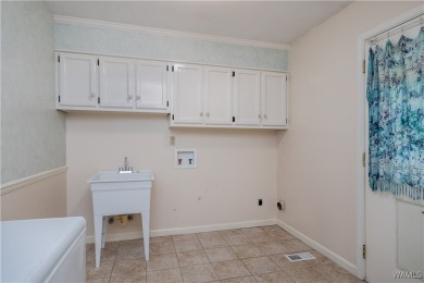 Welcome to 5311 Woodhill Circle - a spacious 4-bedroom, 2-bath on Woodland Forrest Country Club in Alabama - for sale on GolfHomes.com, golf home, golf lot