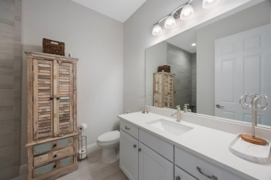 Discover refined, coastal, luxury living in this immaculate on IMG Academies Golf and Country Club in Florida - for sale on GolfHomes.com, golf home, golf lot