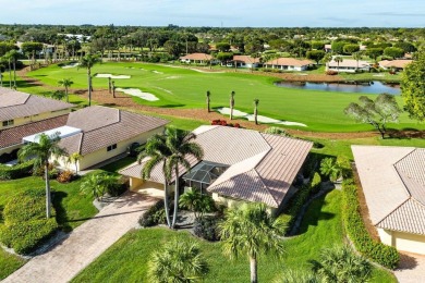 Welcome to your dream home in a fabulous country club setting! on Quail Ridge Golf Course and Country Club in Florida - for sale on GolfHomes.com, golf home, golf lot