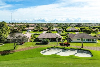 Welcome to your dream home in a fabulous country club setting! on Quail Ridge Golf Course and Country Club in Florida - for sale on GolfHomes.com, golf home, golf lot