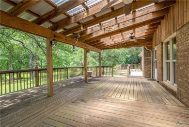 Welcome to 5311 Woodhill Circle - a spacious 4-bedroom, 2-bath on Woodland Forrest Country Club in Alabama - for sale on GolfHomes.com, golf home, golf lot