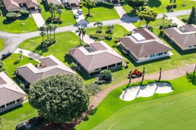 Welcome to your dream home in a fabulous country club setting! on Quail Ridge Golf Course and Country Club in Florida - for sale on GolfHomes.com, golf home, golf lot