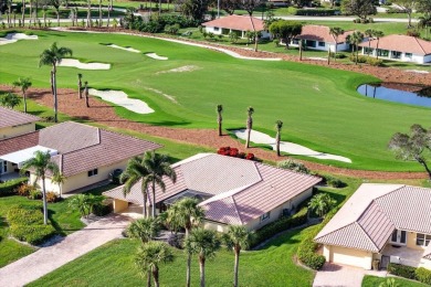 Welcome to your dream home in a fabulous country club setting! on Quail Ridge Golf Course and Country Club in Florida - for sale on GolfHomes.com, golf home, golf lot