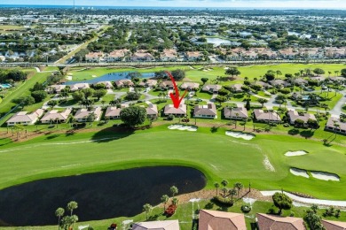 Welcome to your dream home in a fabulous country club setting! on Quail Ridge Golf Course and Country Club in Florida - for sale on GolfHomes.com, golf home, golf lot