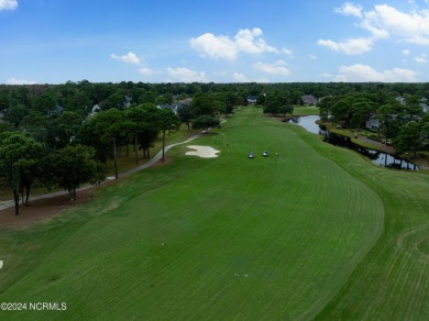 Welcome to this stunning custom-built home by Barker and Canady on Members Club At St. James Plantation in North Carolina - for sale on GolfHomes.com, golf home, golf lot