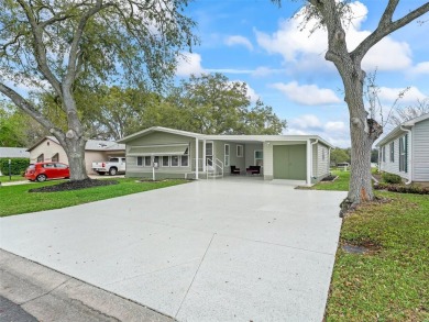 Turn-key, No Bond, Water and Golf View and an incredible home on Orange Blossom Hills Golf and Country Club in Florida - for sale on GolfHomes.com, golf home, golf lot