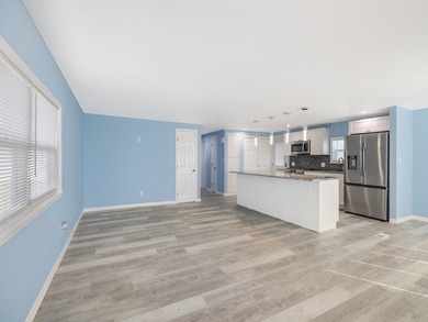 Fully renovated and move-in ready, this upgraded home offers on Barefoot Bay Golf Course in Florida - for sale on GolfHomes.com, golf home, golf lot