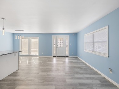 Fully renovated and move-in ready, this upgraded home offers on Barefoot Bay Golf Course in Florida - for sale on GolfHomes.com, golf home, golf lot