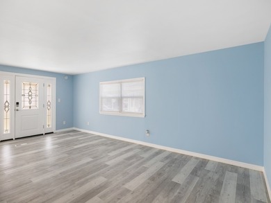 Fully renovated and move-in ready, this upgraded home offers on Barefoot Bay Golf Course in Florida - for sale on GolfHomes.com, golf home, golf lot