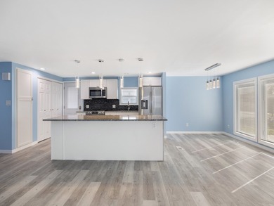 Fully renovated and move-in ready, this upgraded home offers on Barefoot Bay Golf Course in Florida - for sale on GolfHomes.com, golf home, golf lot