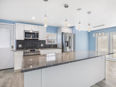 Fully renovated and move-in ready, this upgraded home offers on Barefoot Bay Golf Course in Florida - for sale on GolfHomes.com, golf home, golf lot