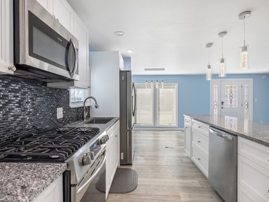 Fully renovated and move-in ready, this upgraded home offers on Barefoot Bay Golf Course in Florida - for sale on GolfHomes.com, golf home, golf lot