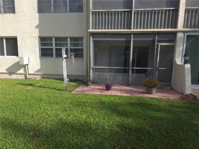 ***SELLER MOTIVATED***Charming 2-Bed, 2-Bath First-Floor Condo on Hollybrook Golf and Tennis Club  in Florida - for sale on GolfHomes.com, golf home, golf lot