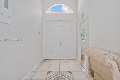 Step into this 3,677 sq ft single family home located in Palm on Keys Gate Golf Club in Florida - for sale on GolfHomes.com, golf home, golf lot