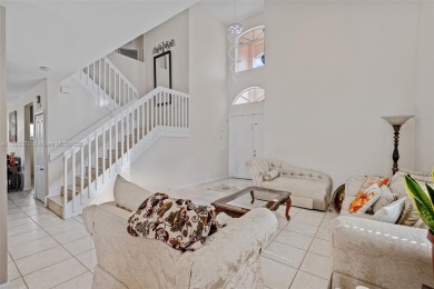 Step into this 3,677 sq ft single family home located in Palm on Keys Gate Golf Club in Florida - for sale on GolfHomes.com, golf home, golf lot