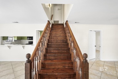 Welcome to this charming Creole cottage located near the Windsor on Lake Forest Yacht and Country Club in Alabama - for sale on GolfHomes.com, golf home, golf lot