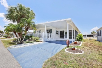 Welcome to your Florida retreat! This charming 1977 manufactured on Maple Leaf Golf and Country Club in Florida - for sale on GolfHomes.com, golf home, golf lot