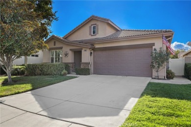 Discover the epitome of comfortable, carefree living in this on Menifee Lakes Country Club - Lakes in California - for sale on GolfHomes.com, golf home, golf lot