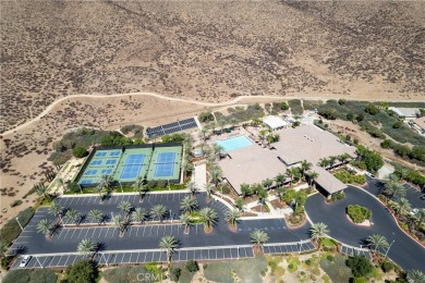 Discover the epitome of comfortable, carefree living in this on Menifee Lakes Country Club - Lakes in California - for sale on GolfHomes.com, golf home, golf lot