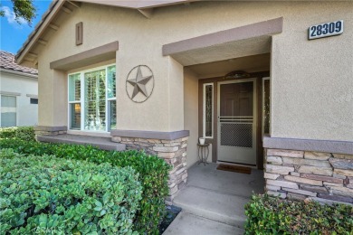 Discover the epitome of comfortable, carefree living in this on Menifee Lakes Country Club - Lakes in California - for sale on GolfHomes.com, golf home, golf lot