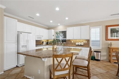 Discover the epitome of comfortable, carefree living in this on Menifee Lakes Country Club - Lakes in California - for sale on GolfHomes.com, golf home, golf lot