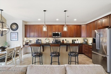 This pristine 3-bedroom, 2.5-bath townhome boasts an impressive on Country Club of the Poconos Golf Course in Pennsylvania - for sale on GolfHomes.com, golf home, golf lot