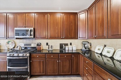 This pristine 3-bedroom, 2.5-bath townhome boasts an impressive on Country Club of the Poconos Golf Course in Pennsylvania - for sale on GolfHomes.com, golf home, golf lot