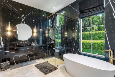 A one-of-a-kind masterpiece in prestigious Seminole Landing on Seminole Golf Club in Florida - for sale on GolfHomes.com, golf home, golf lot