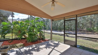 Comfortable end unit condo in the private Spruce Creek Fly In on Spruce Creek Golf Club in Florida - for sale on GolfHomes.com, golf home, golf lot