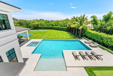 A one-of-a-kind masterpiece in prestigious Seminole Landing on Seminole Golf Club in Florida - for sale on GolfHomes.com, golf home, golf lot