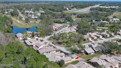 Comfortable end unit condo in the private Spruce Creek Fly In on Spruce Creek Golf Club in Florida - for sale on GolfHomes.com, golf home, golf lot