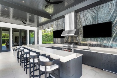 A one-of-a-kind masterpiece in prestigious Seminole Landing on Seminole Golf Club in Florida - for sale on GolfHomes.com, golf home, golf lot