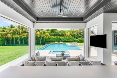 A one-of-a-kind masterpiece in prestigious Seminole Landing on Seminole Golf Club in Florida - for sale on GolfHomes.com, golf home, golf lot