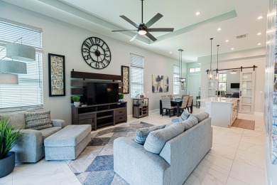 Rivella! Step into luxury with this exquisite 2 bed, 2 bath + on Club Med Sandpiper in Florida - for sale on GolfHomes.com, golf home, golf lot