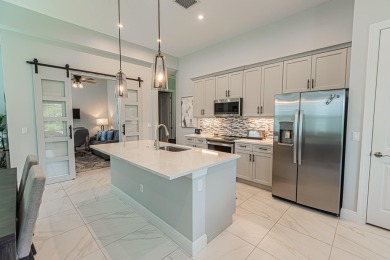 Rivella! Step into luxury with this exquisite 2 bed, 2 bath + on Club Med Sandpiper in Florida - for sale on GolfHomes.com, golf home, golf lot