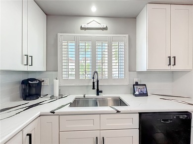 This is it! The best opportunity for condo living that vibes on Oak Harbor Country Club in Florida - for sale on GolfHomes.com, golf home, golf lot