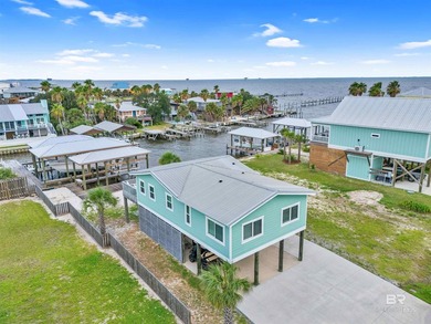 Beautiful, classic beach cottage on Mobile Bay with an on Kiva Dunes Golf Club in Alabama - for sale on GolfHomes.com, golf home, golf lot